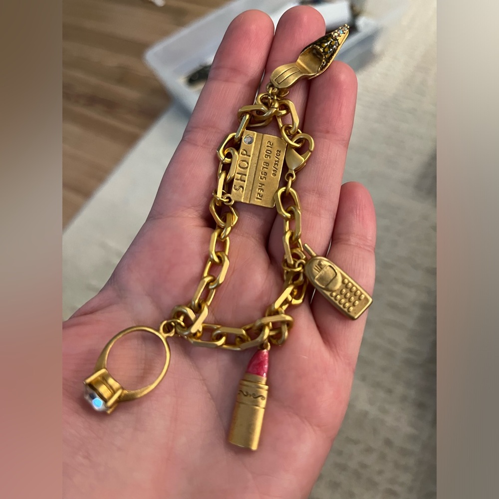 Avon Gold Tone Charm Bracelet